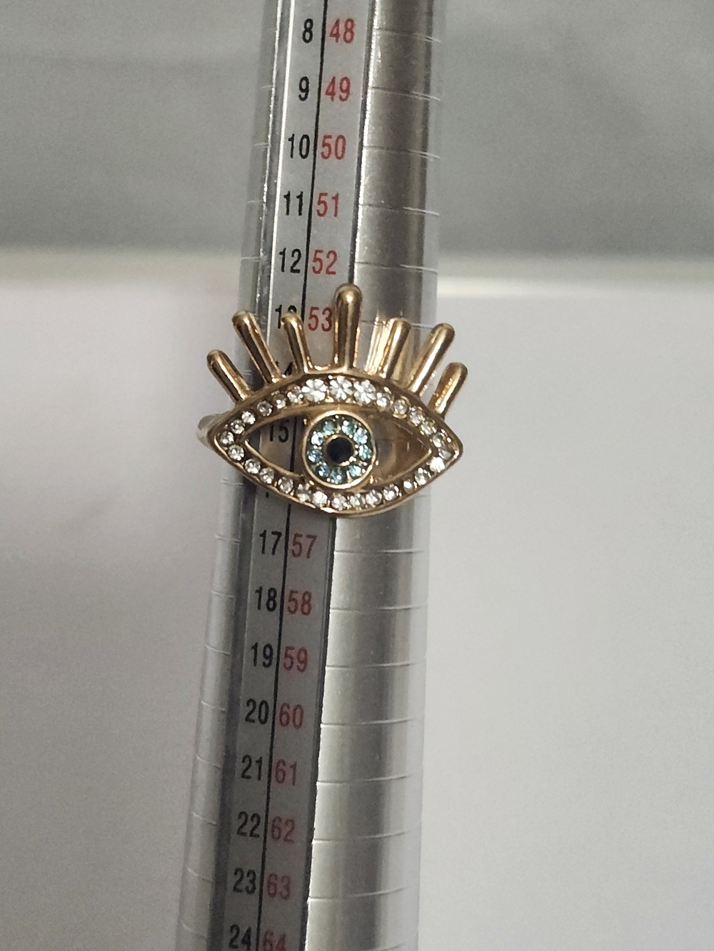 Gold Evil Eye Ring with Blue Crystal Accent